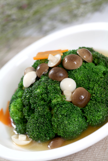 Boiled broccoli in chicken consommé